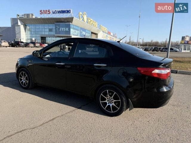 Черный Киа Рио, объемом двигателя 1.4 л и пробегом 162 тыс. км за 7700 $, фото 23 на Automoto.ua