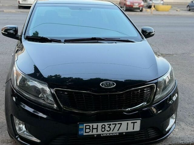 Чорний Кіа Ріо, об'ємом двигуна 1.6 л та пробігом 104 тис. км за 8500 $, фото 2 на Automoto.ua