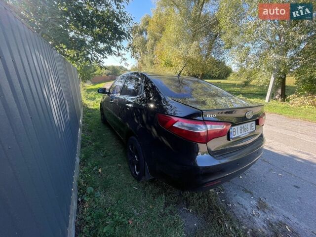 Чорний Кіа Ріо, об'ємом двигуна 1.59 л та пробігом 274 тис. км за 7500 $, фото 3 на Automoto.ua