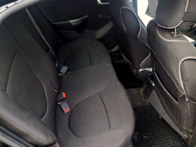 Черный Киа Рио, объемом двигателя 1.4 л и пробегом 197 тыс. км за 7000 $, фото 10 на Automoto.ua