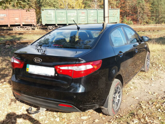 Чорний Кіа Ріо, об'ємом двигуна 1.4 л та пробігом 77 тис. км за 9200 $, фото 1 на Automoto.ua