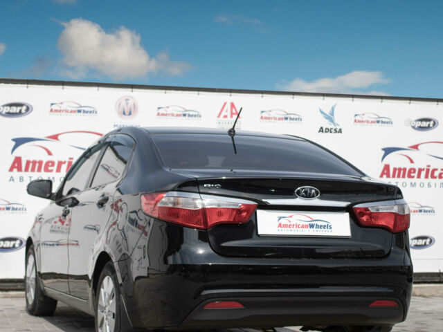 Чорний Кіа Ріо, об'ємом двигуна 1.6 л та пробігом 144 тис. км за 9500 $, фото 4 на Automoto.ua