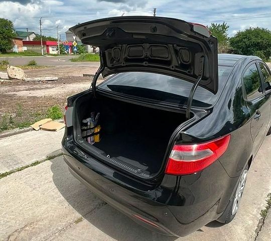 Чорний Кіа Ріо, об'ємом двигуна 1.4 л та пробігом 199 тис. км за 8800 $, фото 8 на Automoto.ua