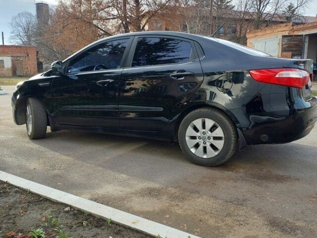 Чорний Кіа Ріо, об'ємом двигуна 0 л та пробігом 246 тис. км за 6800 $, фото 1 на Automoto.ua