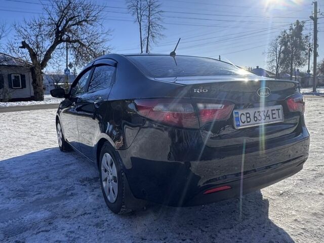Чорний Кіа Ріо, об'ємом двигуна 1.4 л та пробігом 160 тис. км за 7700 $, фото 2 на Automoto.ua