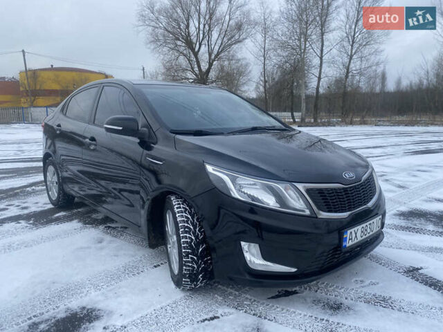 Черный Киа Рио, объемом двигателя 1.59 л и пробегом 249 тыс. км за 6900 $, фото 2 на Automoto.ua