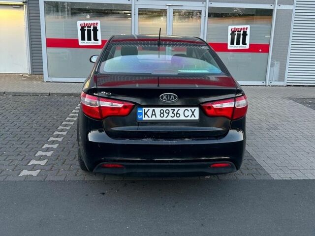 Черный Киа Рио, объемом двигателя 1.4 л и пробегом 190 тыс. км за 6600 $, фото 1 на Automoto.ua