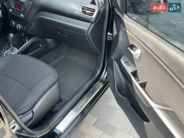Черный Киа Рио, объемом двигателя 1.6 л и пробегом 127 тыс. км за 8300 $, фото 21 на Automoto.ua