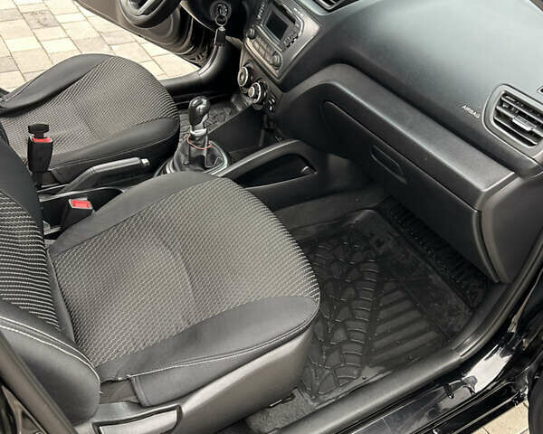 Черный Киа Рио, объемом двигателя 1.4 л и пробегом 111 тыс. км за 7500 $, фото 13 на Automoto.ua