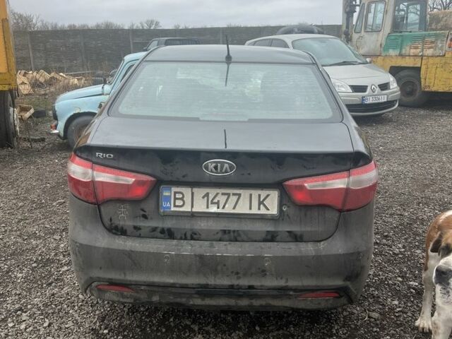 Черный Киа Рио, объемом двигателя 1.4 л и пробегом 120 тыс. км за 3000 $, фото 2 на Automoto.ua