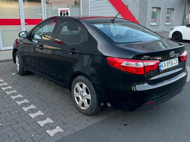 Черный Киа Рио, объемом двигателя 1.4 л и пробегом 190 тыс. км за 6600 $, фото 5 на Automoto.ua