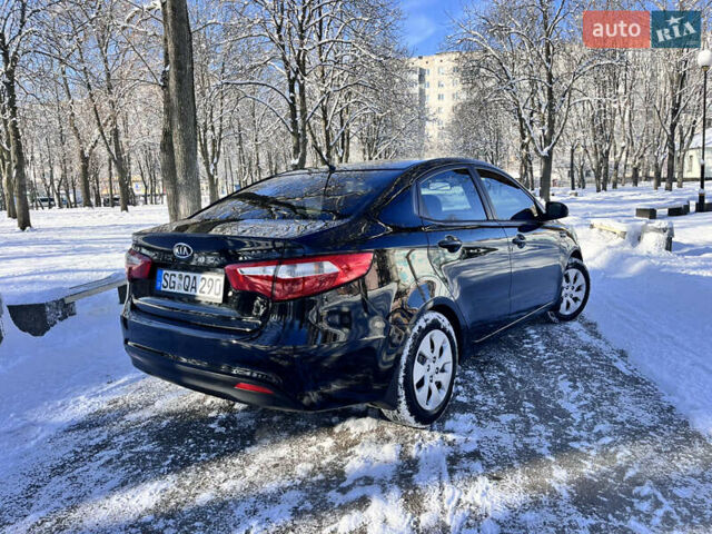 Чорний Кіа Ріо, об'ємом двигуна 1.4 л та пробігом 245 тис. км за 7600 $, фото 11 на Automoto.ua