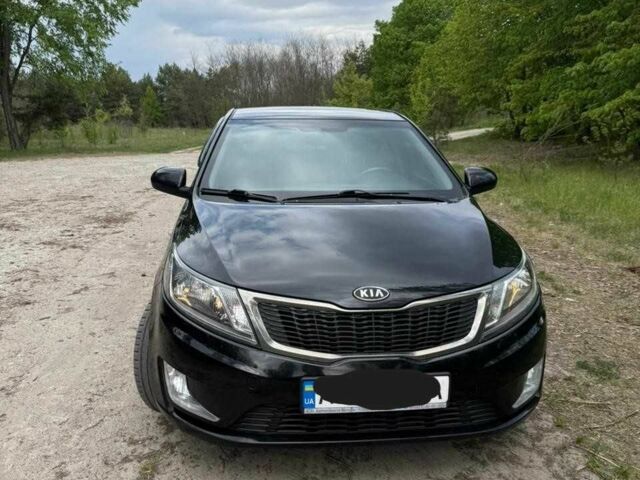 Чорний Кіа Ріо, об'ємом двигуна 1.6 л та пробігом 215 тис. км за 7700 $, фото 8 на Automoto.ua