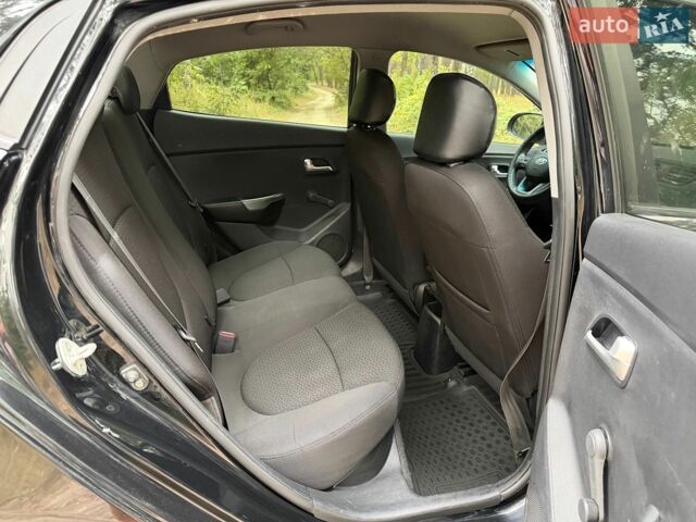 Чорний Кіа Ріо, об'ємом двигуна 1.4 л та пробігом 193 тис. км за 6300 $, фото 17 на Automoto.ua