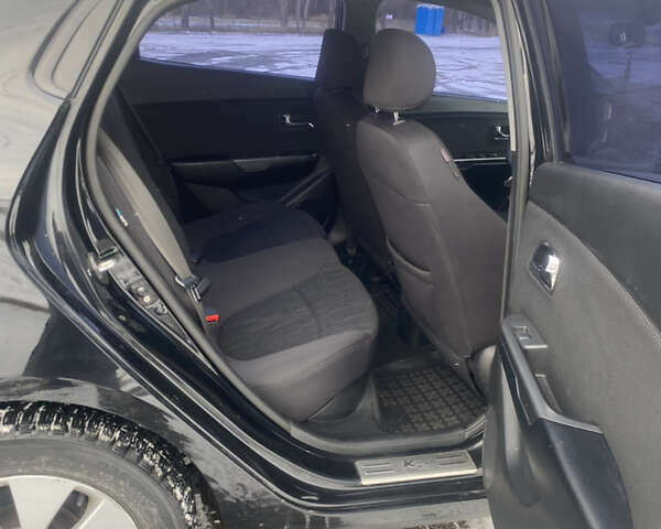 Черный Киа Рио, объемом двигателя 1.59 л и пробегом 250 тыс. км за 6900 $, фото 11 на Automoto.ua