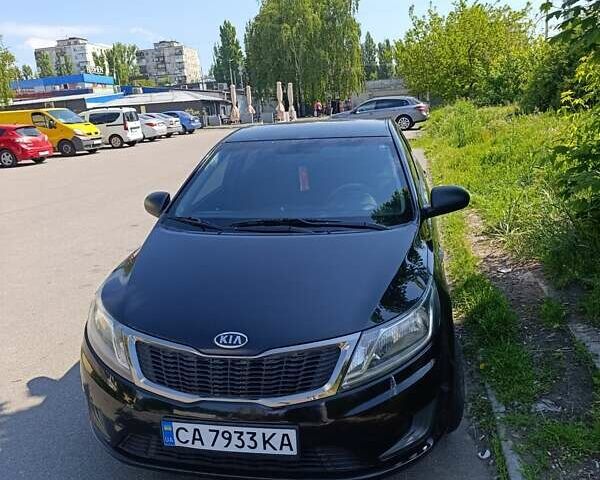 Чорний Кіа Ріо, об'ємом двигуна 1.4 л та пробігом 162 тис. км за 7500 $, фото 2 на Automoto.ua