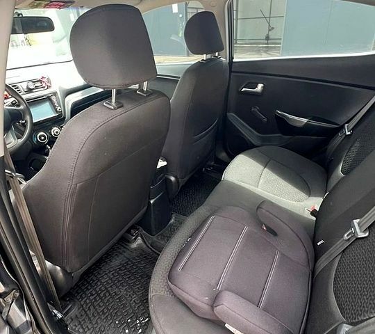Чорний Кіа Ріо, об'ємом двигуна 1.4 л та пробігом 199 тис. км за 8800 $, фото 6 на Automoto.ua