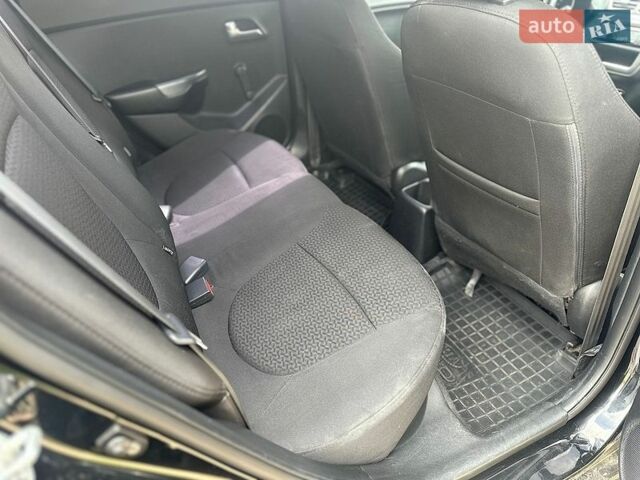 Черный Киа Рио, объемом двигателя 1.4 л и пробегом 108 тыс. км за 7950 $, фото 18 на Automoto.ua