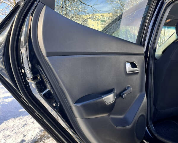 Чорний Кіа Ріо, об'ємом двигуна 1.4 л та пробігом 245 тис. км за 7600 $, фото 26 на Automoto.ua