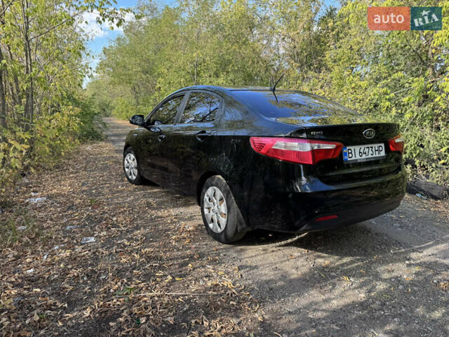 Черный Киа Рио, объемом двигателя 1.4 л и пробегом 173 тыс. км за 7300 $, фото 8 на Automoto.ua