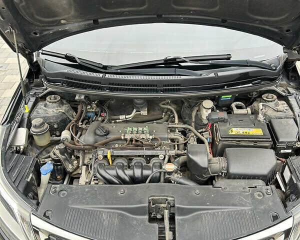 Черный Киа Рио, объемом двигателя 1.4 л и пробегом 111 тыс. км за 7500 $, фото 15 на Automoto.ua