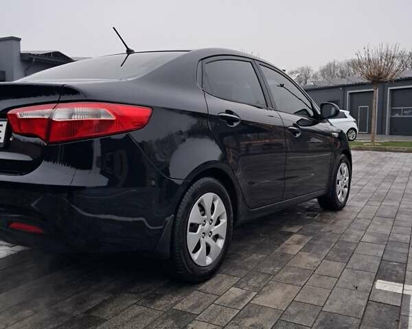 Черный Киа Рио, объемом двигателя 1.4 л и пробегом 244 тыс. км за 6900 $, фото 12 на Automoto.ua
