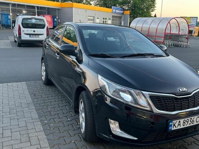 Черный Киа Рио, объемом двигателя 1.4 л и пробегом 190 тыс. км за 6600 $, фото 3 на Automoto.ua