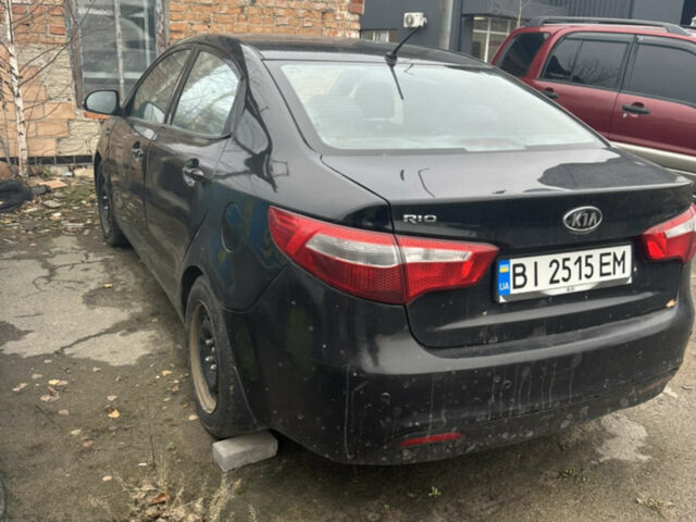 Черный Киа Рио, объемом двигателя 1.4 л и пробегом 100 тыс. км за 3200 $, фото 2 на Automoto.ua