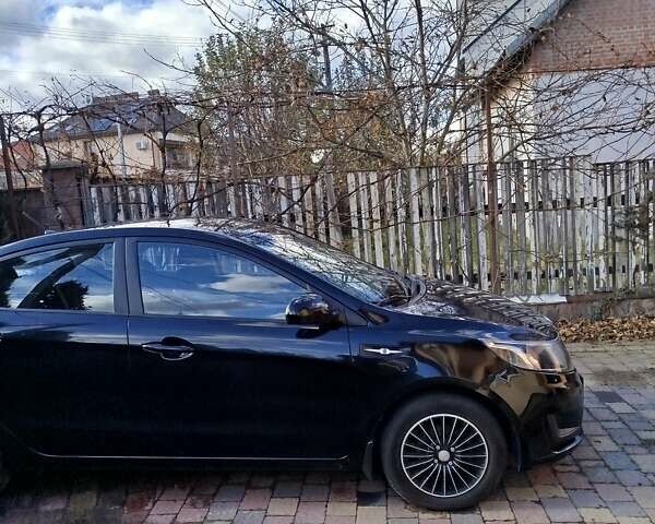 Чорний Кіа Ріо, об'ємом двигуна 1.4 л та пробігом 95 тис. км за 7000 $, фото 2 на Automoto.ua