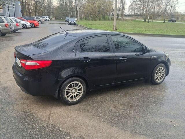 Черный Киа Рио, объемом двигателя 1.4 л и пробегом 197 тыс. км за 7000 $, фото 3 на Automoto.ua