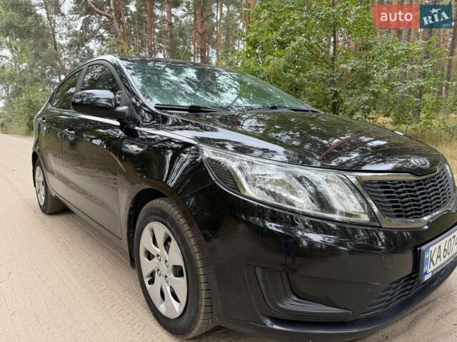 Чорний Кіа Ріо, об'ємом двигуна 1.4 л та пробігом 193 тис. км за 6300 $, фото 2 на Automoto.ua