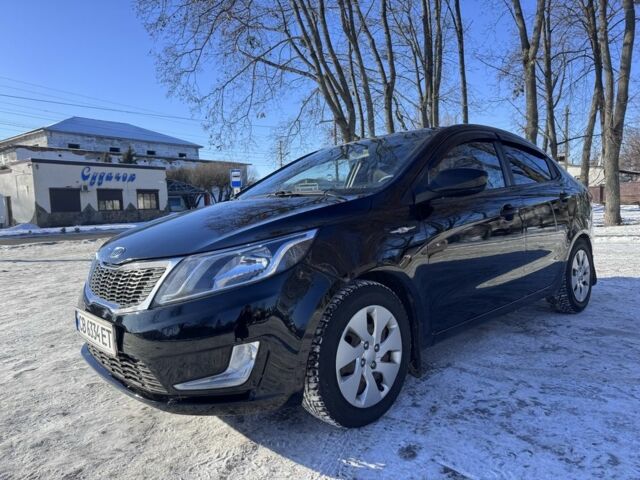 Чорний Кіа Ріо, об'ємом двигуна 1.4 л та пробігом 160 тис. км за 7700 $, фото 1 на Automoto.ua