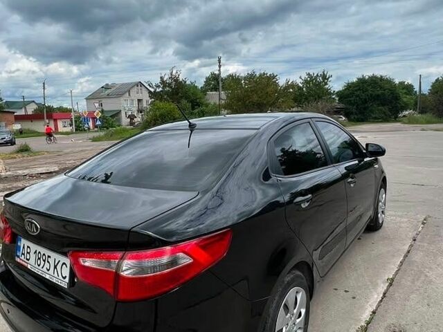 Черный Киа Рио, объемом двигателя 1.4 л и пробегом 199 тыс. км за 8600 $, фото 1 на Automoto.ua