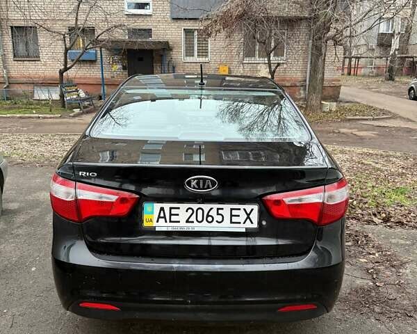 Чорний Кіа Ріо, об'ємом двигуна 1.4 л та пробігом 154 тис. км за 7500 $, фото 2 на Automoto.ua