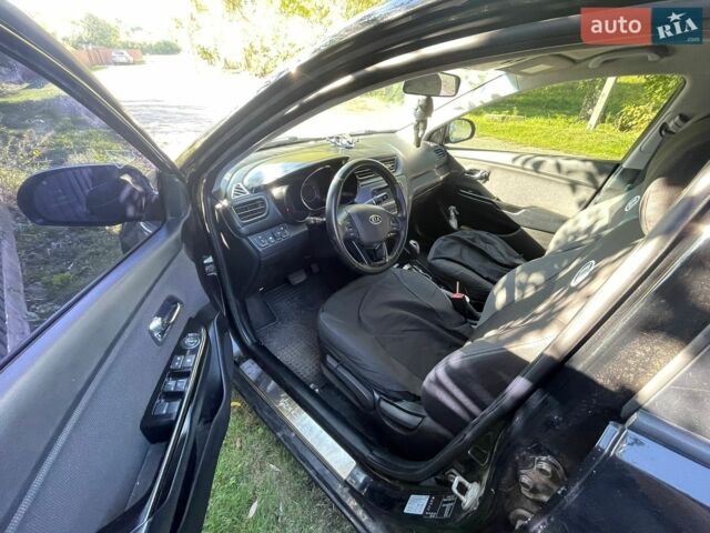 Чорний Кіа Ріо, об'ємом двигуна 1.59 л та пробігом 274 тис. км за 7500 $, фото 4 на Automoto.ua