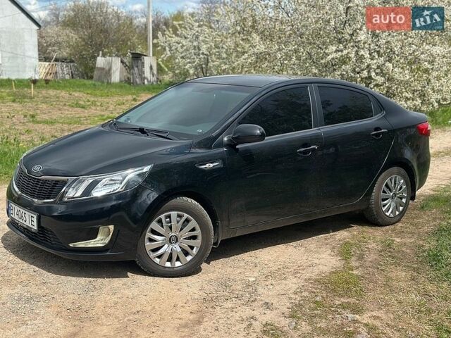 Черный Киа Рио, объемом двигателя 1.4 л и пробегом 108 тыс. км за 7950 $, фото 5 на Automoto.ua