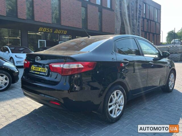 Черный Киа Рио, объемом двигателя 1.4 л и пробегом 77 тыс. км за 7700 $, фото 5 на Automoto.ua