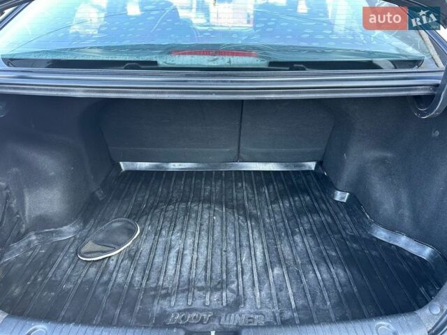 Чорний Кіа Ріо, об'ємом двигуна 1.59 л та пробігом 197 тис. км за 5888 $, фото 57 на Automoto.ua