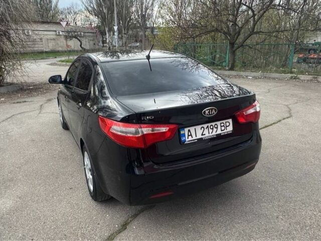 Чорний Кіа Ріо, об'ємом двигуна 1.6 л та пробігом 273 тис. км за 6200 $, фото 5 на Automoto.ua