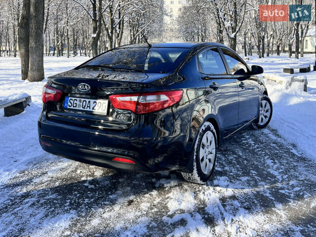 Чорний Кіа Ріо, об'ємом двигуна 1.4 л та пробігом 245 тис. км за 7600 $, фото 16 на Automoto.ua
