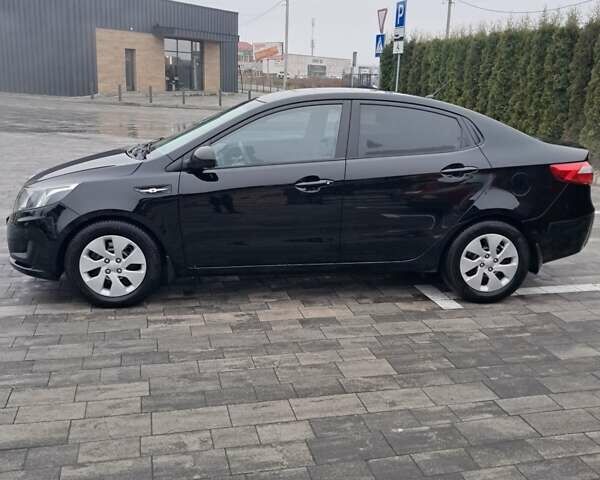 Черный Киа Рио, объемом двигателя 1.4 л и пробегом 244 тыс. км за 6900 $, фото 7 на Automoto.ua