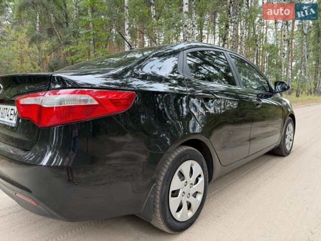 Чорний Кіа Ріо, об'ємом двигуна 1.4 л та пробігом 193 тис. км за 6300 $, фото 7 на Automoto.ua