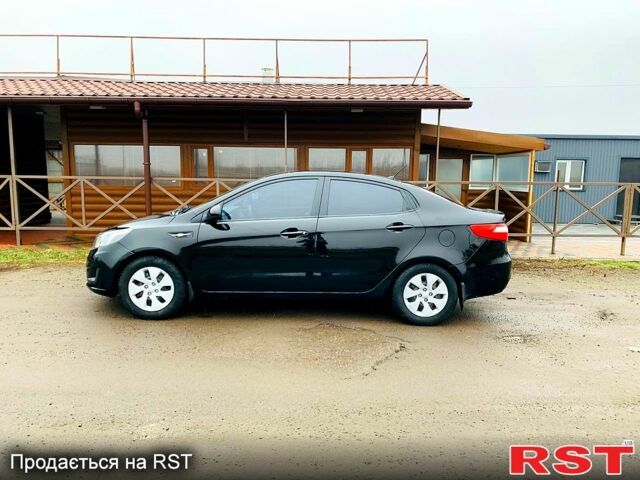 Черный Киа Рио, объемом двигателя 1.4 л и пробегом 150 тыс. км за 8500 $, фото 3 на Automoto.ua