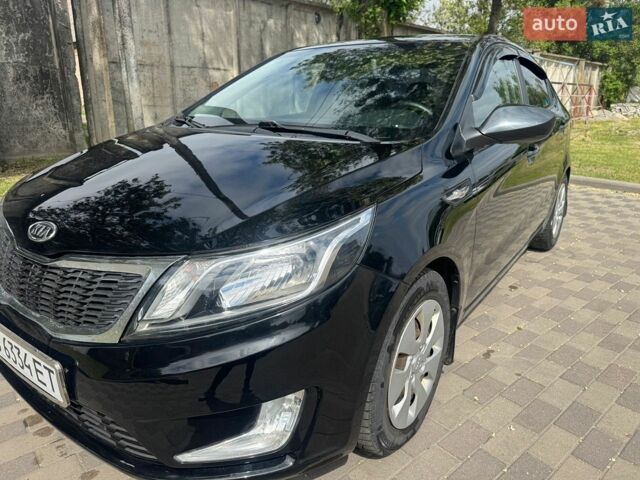 Черный Киа Рио, объемом двигателя 1.4 л и пробегом 155 тыс. км за 7500 $, фото 18 на Automoto.ua