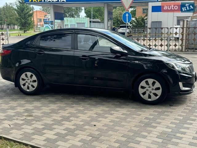 Черный Киа Рио, объемом двигателя 1.4 л и пробегом 155 тыс. км за 7500 $, фото 4 на Automoto.ua