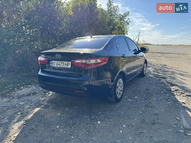 Черный Киа Рио, объемом двигателя 1.4 л и пробегом 173 тыс. км за 7300 $, фото 4 на Automoto.ua