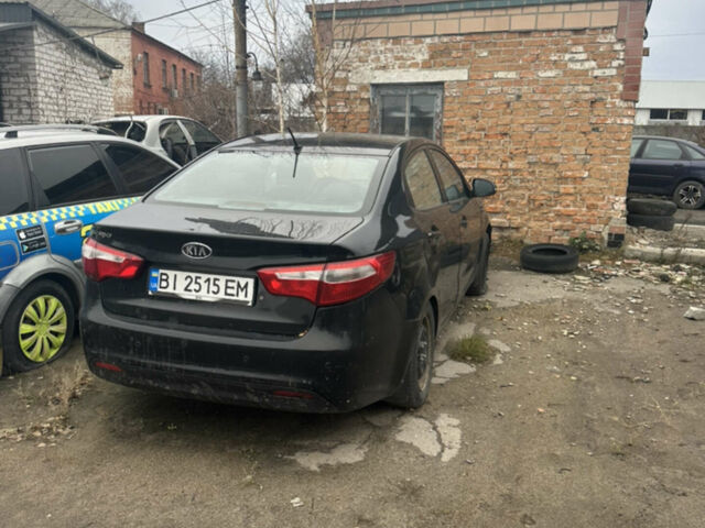 Черный Киа Рио, объемом двигателя 1.4 л и пробегом 100 тыс. км за 3200 $, фото 1 на Automoto.ua
