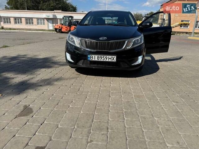 Чорний Кіа Ріо, об'ємом двигуна 1.4 л та пробігом 158 тис. км за 8300 $, фото 21 на Automoto.ua