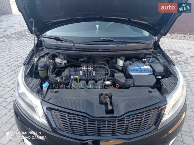 Черный Киа Рио, объемом двигателя 1.6 л и пробегом 285 тыс. км за 7800 $, фото 2 на Automoto.ua