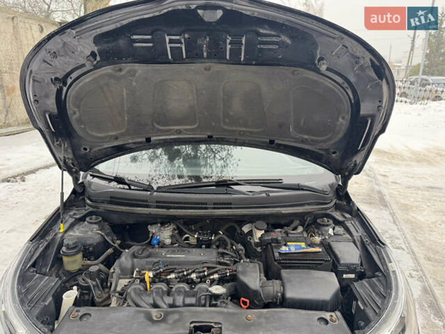 Черный Киа Рио, объемом двигателя 1.4 л и пробегом 155 тыс. км за 7500 $, фото 34 на Automoto.ua